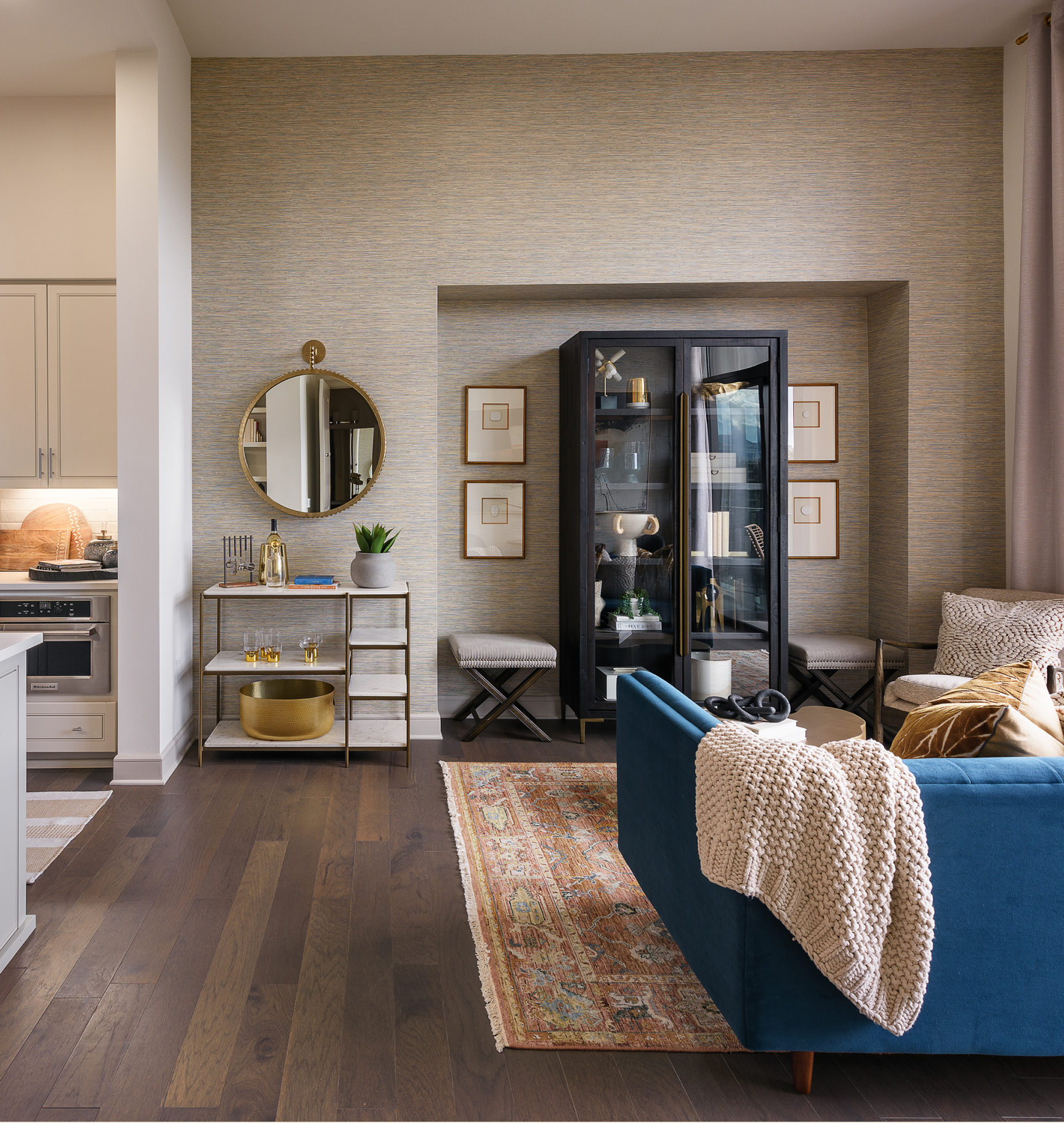 A mobile image of a living room space with a mirror